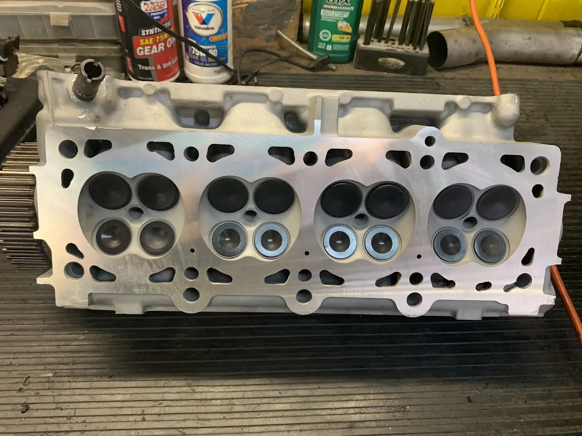 Machined cylinder head with valves at RepairTech Automotive engine rebuild service