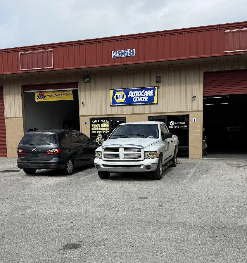 RepairTech Automotive shop exterior at 2968 Michigan Ave with NAPA AutoCare Center sign in Kissimmee FL